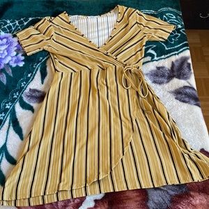 Cute mustard colour dress going for 25$